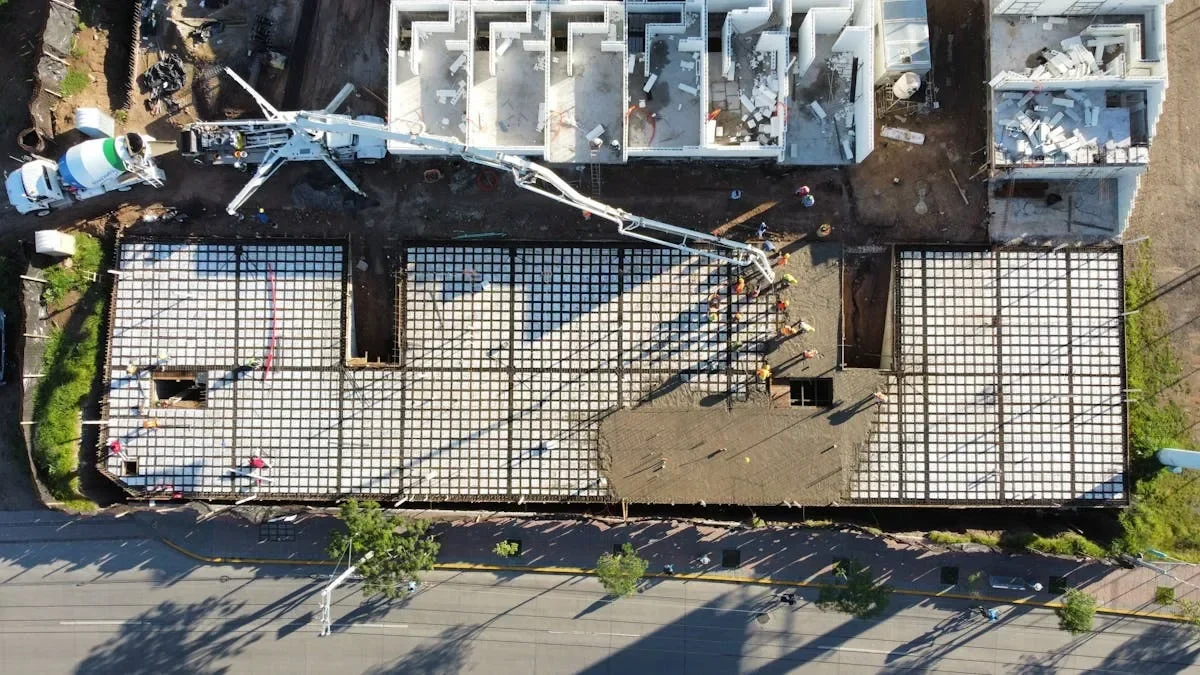 Aerial shot of a bustling construction site in León, Mexico, during the day.