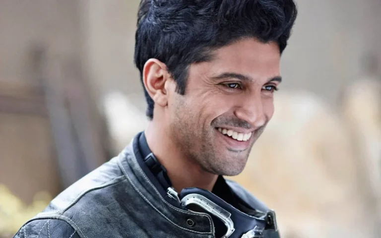 Foto Kang Kabupaten Tangerang 2025, Muhammad Farhan, tersenyum mengenakan jaket kulit.