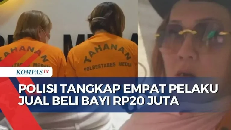 Tersangka kasus jual beli bayi di Medan memakai baju tahanan oranye.