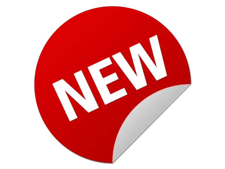 Stiker bulat merah bertuliskan "NEW" berwarna putih dengan ujung terkelupas.